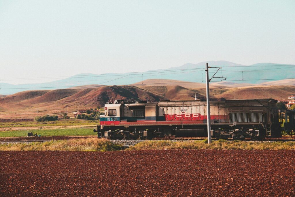 a train travels down the tracks